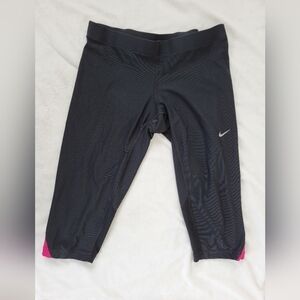 Nike Dry-fit capri black with pink and mesh detailing zip pocket on back size S.